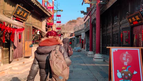 In-January-2020,-before-al-frontiers-were-closed,-tourists-enjoyed-the-last-days-of-travel-in-Gubei-Water-Town-before-isolation-due-to-covid-restrictions