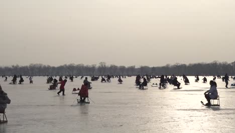 Days-before-China-went-in-complete-lockdown-due-to-covid,-people-spent-their-holiday-of-Chinese-New-Year-sledding-on-the-frozen-lake-of-the-Summer-Palace