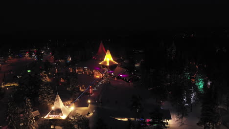 Night-Aerial-View-of-Christmas-Lights-at-Santa-Claus-Village,-Finland,-Static-Shot