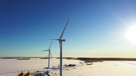 Aerial-view-around-wind-turbines-at-the-Oulunsalo-bay,-in-Finland---circling,-drone-shot