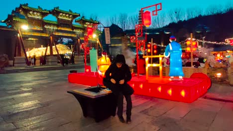 Gubei-Water-Town-is-a-tourist-attraction-as-it-sits-bellow-a-portion-of-the-Great-Wall-and-peopl-enjoyed-the-Chinese-New-Year-celebrations-in-a-fair-in-town-during-winter