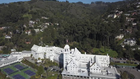 Aerial-View-of-Claremont-Hotel-Resort-and-Spa,-Historic-Property-in-Oakland,-California-USA-on-Sunny-Day,-Drone-Shot
