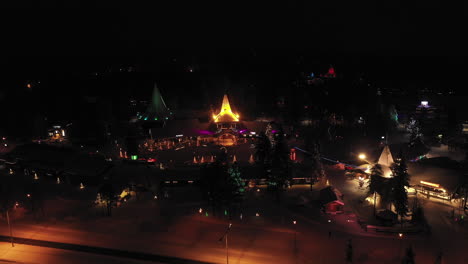 Christmas-Aerial-View-of-Santa-Claus-Village-Home,-Lapland,-Finland,-Dolly-out