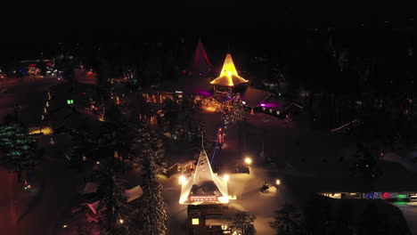 Glowing-Christmas-Colours-of-Santa-Claus-Village-Main-Residence,-Finland,-Lapland,-Established-Shot