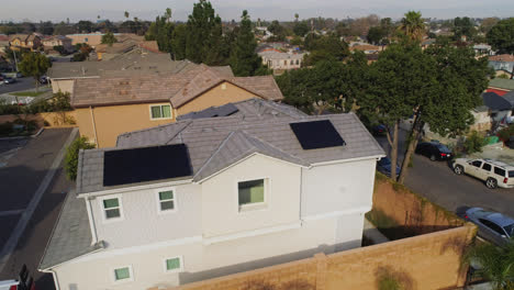 Workers-After-Finishing-Install-Solar-Panels-On-House-In-Los-Angeles,-California-On-A-Sunny-Day