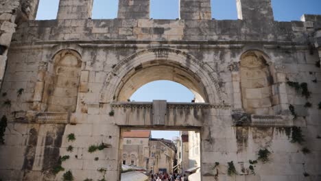 Split-town-walls-pan-down-to-square