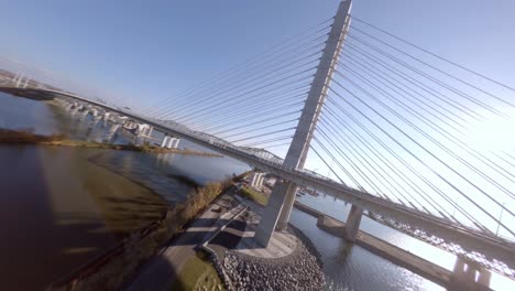FPV-Acrobatic-Flying-Underneath-Samuel-De-Champlain-Bridge-Over-Saint-Lawrence-River