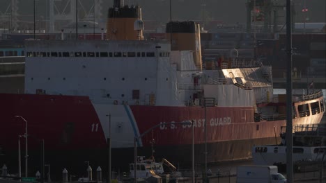 Close-Up-of-US-Coast-Guard-Ship-Moored-in-Port-at-Sunset,-Seattle,-Washington-USA
