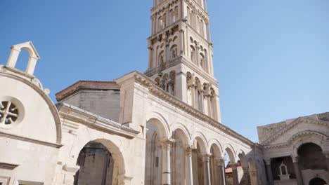 Split-Saint-Domnius-cathedral-pan-down-to-square-with-tourists