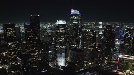 Los-Angeles-CA-USA-Downtown-at-Night,-Aerial-View-of-Illuminated-Skyscrapers-and-Traffic