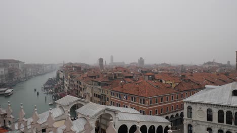 Panning-shot-of-Venice-from-the-terrace-of-Rialto-Hotel-on-a-misty,-cloudy-day