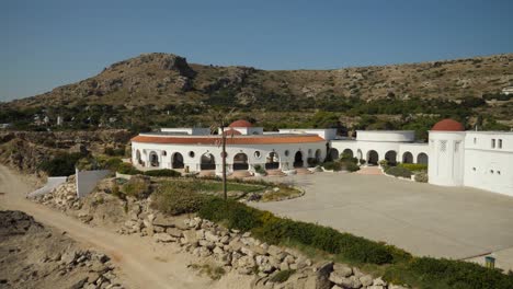 High-angle-view-of-a-round-building-at-Kallithea-Springs-with-hill-in-background