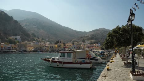 View-of-boats-moored-in-the-harbour-and-big-hill-in-the-bacground-in-Symi-Island