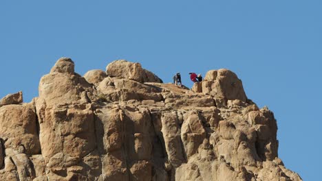 Climbers-on-top-of-the-cliff-in-Teide-National-Park,-Tenerife