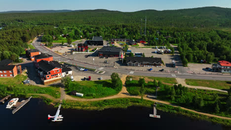 Aerial-view-of-the-town-center-of-Inari,-sunny,-summer-day-in-Lapland,-Finland