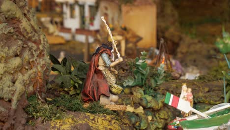 Moving-fisherman-miniature-statue-in-model-village,-Christmas-decoration-in-Candelaria-village,-Tenerife