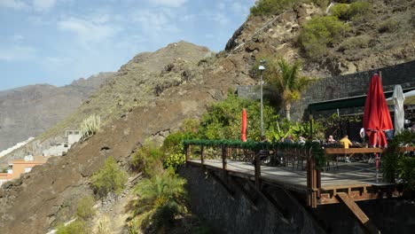 Terrace-of-a-restaurant-on-the-side-of-the-mountain-in-Los-Gigantes