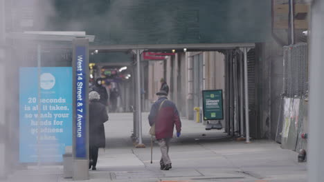 Men-with-face-mask-walking-in-slow-motion-with-smoke-filling-up-the-frame