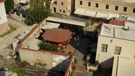 High-angle-shot-of-an-outdoor-bar-in-the-Old-Town-of-Rhodes