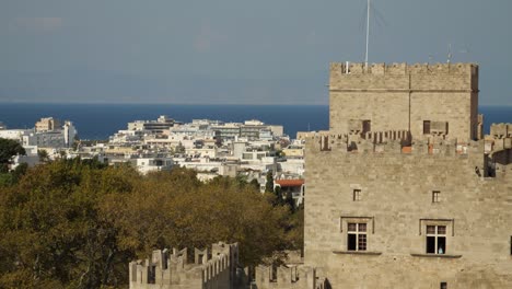 View-of-old-Rodos-Town-with-Palace-of-the-Grand-Master-of-the-Knights-of-Rhodes-and-Turkey-in-background