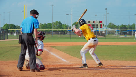Slow-Motion-Shot-Of-Baseball-Batter-Hitting-Hard-The-Ball-In-Baseball-Field,-Florida,-USA