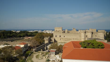 Panoramic-view-of-Palace-of-the-Grand-Master-of-the-Knights-of-Rhodes,-Turkey-in-background
