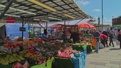 People-Browsing-Local-Fruit-and-Vegetable-Stall-at-Lewisham-Market-in-London