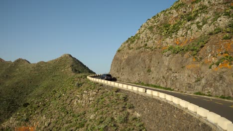 Cars-on-a-narrow-mountain-road-near-Masca,-Tenerife