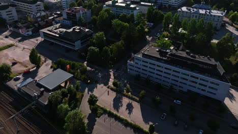 Aerial-view-around-streets-of-downtown-Jyvaskyla-city,-sunny-summer-day-in-Finland