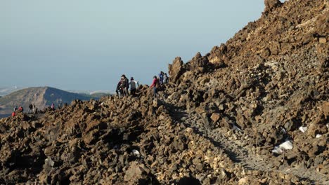 Hikers-on-the-rocky-pathway-on-Mount-Teide