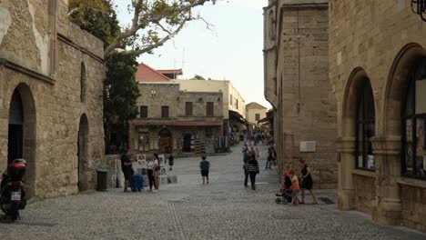 Daily-life-on-the-square-in-front-of-the-museum-in-Old-Town-of-Rhodes