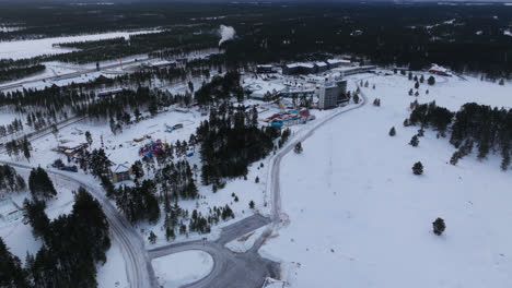 Aerial-view-overlooking-the-JukuPark-Kalajoki-water-park,-gloomy,-winter-day-in-Finland