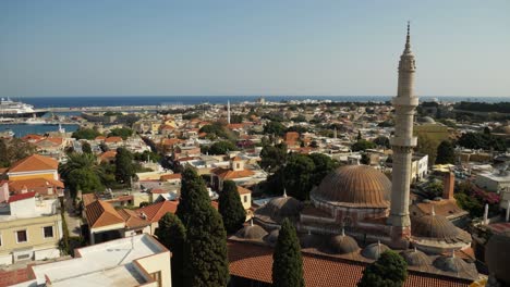 Parnomaric-view-of-the-Old-Town-of-Rhodes,-Suleiman-Mosque-in-foreground,-Sea-in-background