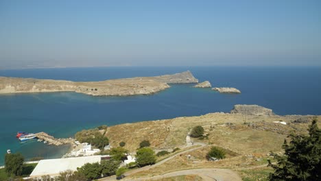 Panoramic-view-of-the-bay,-Pallas-Beach-and-the-small-islets-from-Lindos-Acropolis