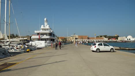 Big-yacht-moored-in-colorful-Rhodes-harbour