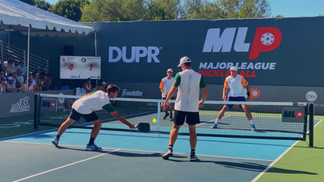 Competitive-Men´s-Doubles-Starting-Game-Point-Scored-at-the-Major-League-Pickleball,-in-Sunny-Newport-Beach,-California,-USA---Handheld-Close-Up