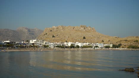 View-of-Charaki-Beach-with-Feraklos-Castle-on-the-hill