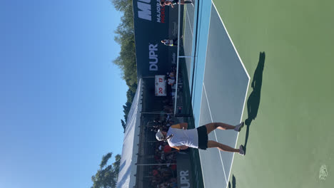 People-playing-pickleball-at-the-competitive-MLP-tournament,-in-Newport-Beach,-California,-USA-Vertical-view