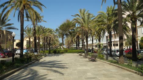 Square-Gavriil-Charitou,-Green-park-with-palm-trees-in-Rodos-Town