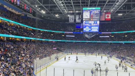 Ice-Hockey-Fans-Cheering-During-Tampa-Bay-Lightning-Hockey-Game-At-An-Indoor-Ice-Rink-Arena