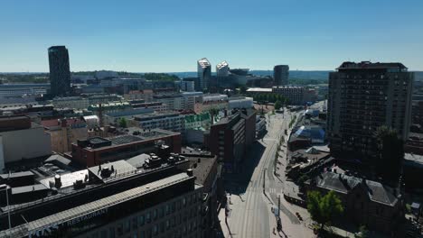 Aerial-view-of-a-quiet-streets-in-Tampere-city,-Finland---tracking,-drone-shot