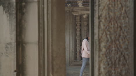 Tourist-Strolling-through-Angkor-Wat-Temple