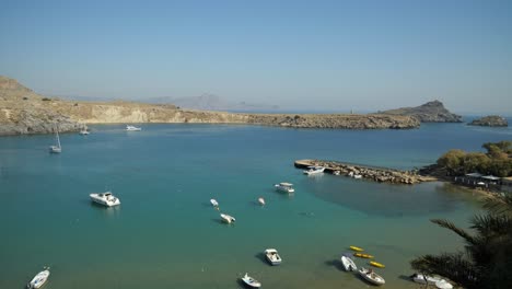 Many-boats-in-the-bay-at-Lindos,-Part-one