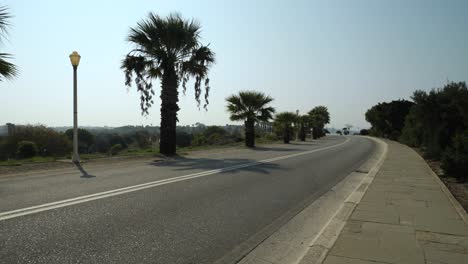 Car-passing-by-on-the-quiet-road-near-Rodos-Town