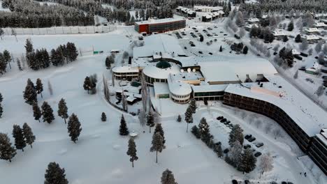 Aerial-view-around-the-Holiday-club-Katinkulta-resort-in-Vuokatti,-Finland---orbit,-drone-shot