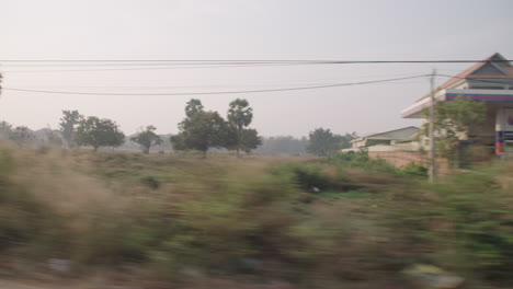 Cambodian-Country-side-travelling-shot-from-a-car