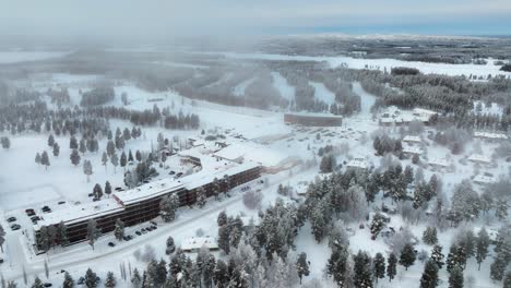 Aerial-view-around-the-Holiday-club-Katinkulta-spa-resort-in-Vuokatti,-Finland---orbit,-drone-shot