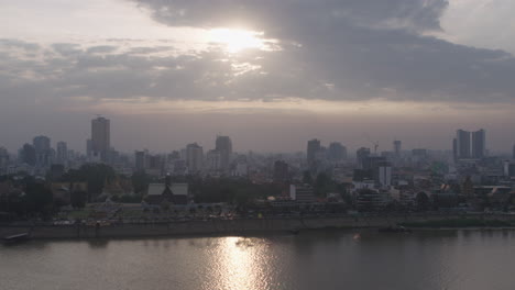Sunset-on-polluted-Phnom-Penh-skyline-pan-right
