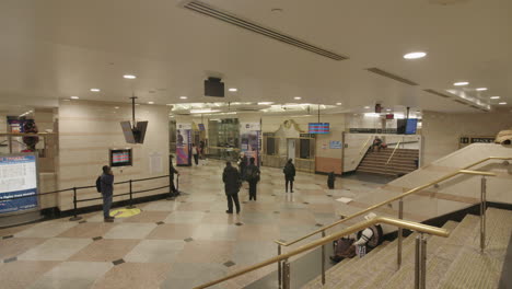 Passengers-waiting-for-train-respecting-social-distancing-inside-Penn-Station