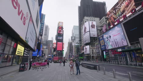 Empty-Time-Square-with-naked-cowboy-wearing-face-mask-during-coronavirus-outbreak